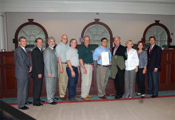 Mack, W4AX and Ian, AK4IK Receive proclamation from Mayor Eva Galambos