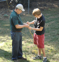 Jim helping David build antenna